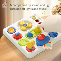 Jouets Montessori pour bébés Chengji en gros : Cube d'activités sensorielles multifonctionnel lumineux et musical, planche d'activités pour bébés