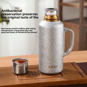 Elegante tetera con revestimiento de titanio, separador de agua y té integrado, diseño portátil, lista para usar - Product Image 3