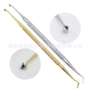 Accessoire dentaire jetable pour blanchiment des dents avec tête en mousse et manche or/argent - Product Image 1