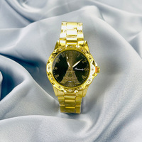 Montre pour femme tendance, style Tour Eiffel de Paris, luxe de niche, sertie de diamants, montre à quartz britannique pour femme
