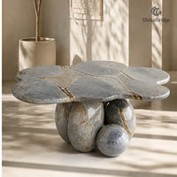 Table en pierre naturelle de quartzite bleu Roma personnalisée, modèle Couronne de pétales, pour projets hôteliers et villas