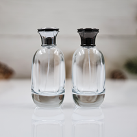 Vente en gros de bouteille de parfum plate en verre de 100ml couvercle en alliage de zinc boîte-cadeau personnalisée diffuseur sérigraphie manipulation de surface de gel