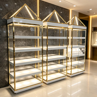 Vitrine à bijoux en verre avec cadre doré luxueux, éclairage LED, présentoir intelligent pour lunettes, adapté aux boutiques et centres commerciaux
