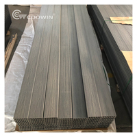 Planches de terrasse composites creuses en PVC moderne de 23 mm, WPC imperméable, co-extrudé, imitation bois, installation facile pour jardin extérieur