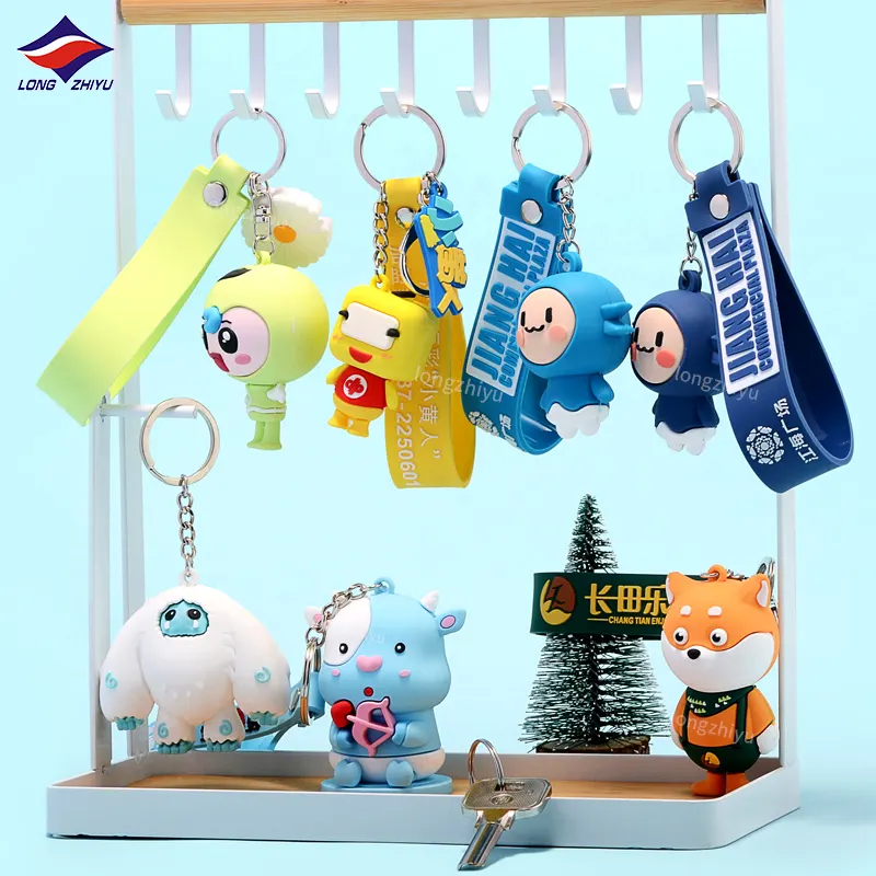 Longzhiyu personnalisé 3D dessin animé mignon PVC porte-clés poupée bleu clair porte-clés cadeaux avec Logo personnalisé 17 ans fabricant