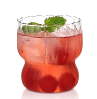 Vente en gros Tasse en verre nervuré unique Origami Ensemble de verres à boire ondulés pour mariages Cocktails Tasse en verre Tasse à café