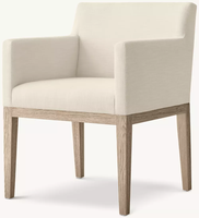 Fauteuil de salle à manger moderne et élégant avec dossier incurvé lisse et accoudoirs en tissu, coussin d'assise élastique.