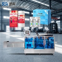 Machine d'emballage automatique pour sachets, sticks, boîtes, aliments et cosmétiques, avec chargement par le haut et par le bas