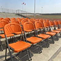 Chaise pliante orange pour hôtel, siège pliant en plastique pour salle de banquet, restaurant, mariage et conférence