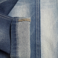 Tissu denim hautement extensible, mélange coton-polyester, texture fil 7S OE, rouleaux de denim économiques en gros