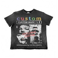 T-shirt vintage noir clouté et déchiré avec motifs grunge et détails rivetés pour hommes et femmes, coupe oversize, style streetwear Y2K