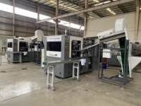 Machine de soufflage entièrement automatique pour la fabrication de bouteilles de shampooing en plastique PET de 1L et 5L, avec moteur servo et économie d'énergie