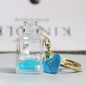 Liquid Floating Milk Box Keychain Cute Cartoon Penguin Fish Tortoise Keyring Creative Colorful <b>Cord</b> Bag Car Key Chain - Product Image 2
