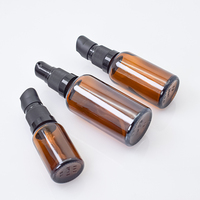 Haute qualité fond rond soins de la peau soins du corps huile capillaire Essence essentielle Lotion ambre sérum bouteille en verre avec bouchon de pompe à bec
