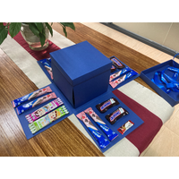 Boîte cadeau surprise explosive haut de gamme personnalisée bleue pour album photo d'anniversaire, de mariage ou de célébration, avec bonbons et chocolats, vente en gros