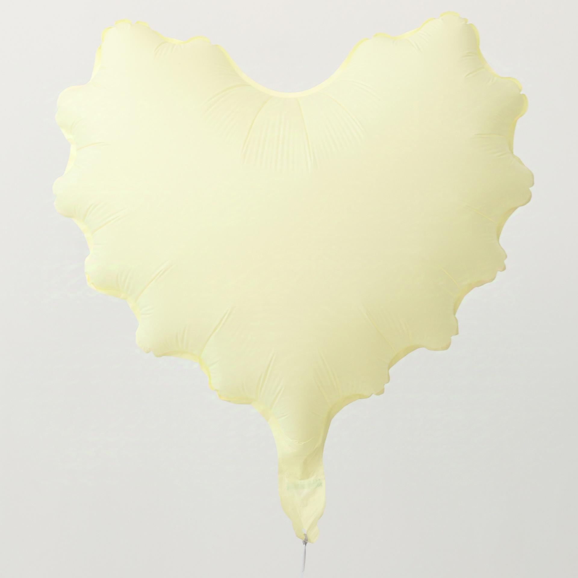 ลูกโป่งรักรูปคลื่นสีเหลืองนม