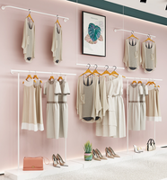 Présentoir de magasin de boutique en acier inoxydable avec porte-vêtements en or Porte-vêtements d'occasion pour la vente de centre commercial
