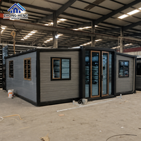 Casa Contenedor Expandible en Forma de T, Estructura de Acero Gris Claro, Puerta Doble Corredera, Villa Prefabricada para Alquiler Vacacional, Diseño Moderno, 5 Años de Garantía