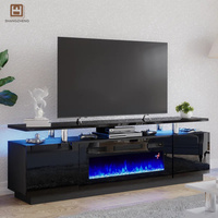 Gabinete de TV de moda Premium Base blanca con iluminación LED azul con decoración de chimenea
