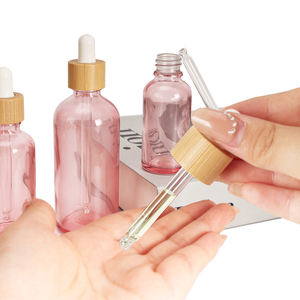 Venta al por Mayor de Botellas de Vidrio Rosa Vacías y Ecológicas de 5ml, 10ml, 15ml, 20ml, 30ml, 50ml y 100ml con Gotero y Tapa de Bambú para Aceites Esenciales - Product Image 4