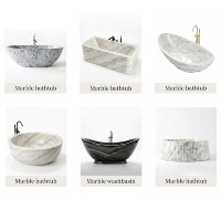 Baignoire autoportante en marbre Nero Marquina veiné or et noir, luxueuse et moderne, pour salles de bain d'hôtels et villas haut de gamme