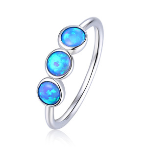 Bijoux de mode bague <span class=keywords><strong>opale</strong></span> <span class=keywords><strong>blanche</strong></span> ou bleue bijoux <span class=keywords><strong>opale</strong></span> en argent sterling 925 bagues plaquées or ou rhodium pour femmes - Product Image 1
