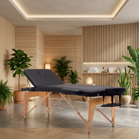 Table de massage thaïlandaise professionnelle pliable et réglable, en bois et cuir noir, très vendue