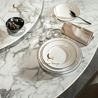 Table à manger ronde de luxe avec plateau tournant en marbre et base métallique, prix de gros populaire