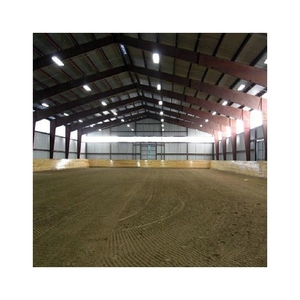 Manège intérieur isolé en <span class=keywords><strong>acier</strong></span> pour climats froids, bâtiment métallique résistant aux charges de neige pour chevaux - Product Image 1