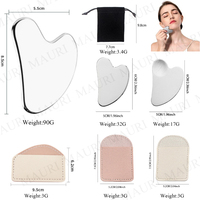 Vente en gros d'outils Guasha en acier Outil de massage économique 1.5mm en forme de coeur Gua Sha Skincare pour femme