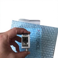 Nouvel amplificateur Keyence LR-W500 avec capteur photoélectrique à point blanc intégré. Gamme de détection : 30 mm à 500 mm