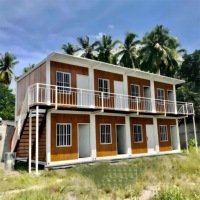 Unité d'habitation annexe avec maison conteneur ADU et conception de conteneur à masse thermique pour un espace de vie familial moderne et durable