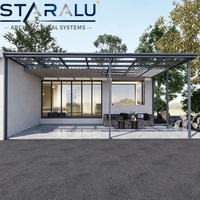 Véranda élégante en aluminium et verre conçue pour les jardins d'hiver, offrant une luminosité naturelle maximale et une rétention thermique optimale