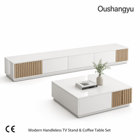 Meuble TV mural blanc brillant moderne, console multimédia de luxe en bois cannelé avec éclairage LED, ensemble table basse pour projet de villa CE
