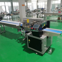 Machine d'emballage horizontale automatique pour barres protéinées, biscuits et gâteaux, avec impression de date PLC et emballage flow-pack