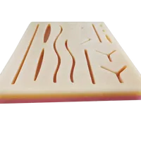 Coussinet de suture en silicone à simulation élevée, kit de formation à suture médicale, modèle de peau traumatique humaine