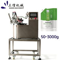 Machine de remplissage et de bouchage rotative Doypack pour shampoing et détergent