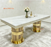 Nouvelle table à manger rectangulaire de style luxueux en acier inoxydable doré brillant et marbre pour restaurant et banquet