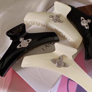 Vente en gros de pinces à cheveux en forme de nœud, accessoires pour cheveux en acrylique pour femmes et filles, pinces à cheveux de luxe - Product Image 1