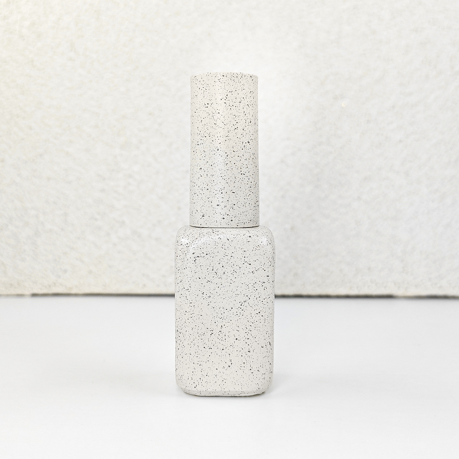 Botella rectangular delgada