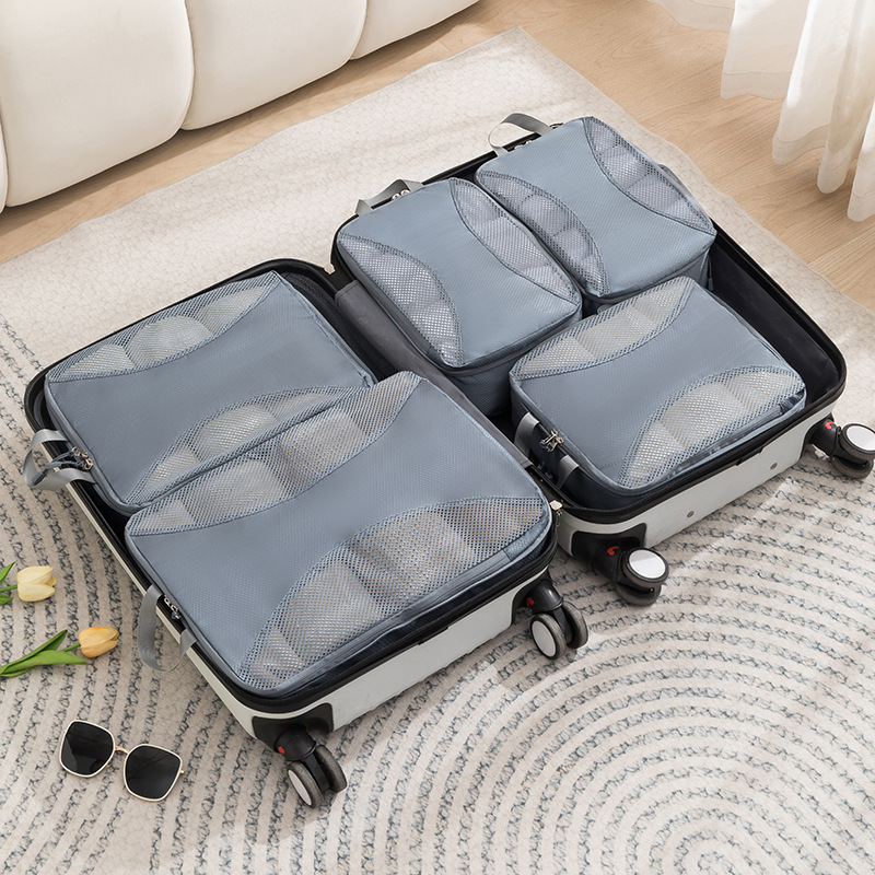 Ensemble cinq pièces de compression gris