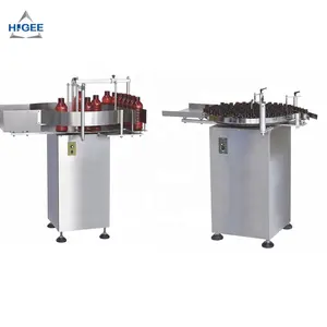 Long life service automatic bottle feeding machine with round bottle labeling machine turning table with liquid filling machine