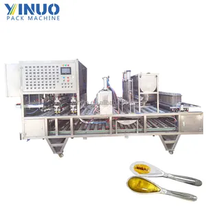 Yijianuo Food Grade Automatic Cup Spoon Plastic Box Filling And Sealing Machine For Honey Qiuli Paste