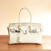 Sac à main en cuir véritable pour femme, sac fourre-tout de luxe en cuir de vachette pleine fleur avec poignée supérieure et quincaillerie argentée, nouvelle collection 2026, OEM, faible MOQ, directement de l'usine
