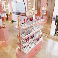 Meubles de magasin de cosmétiques en bois personnalisés modernes et tendance, présentoir à parfums rose sur mesure pour l'agencement de magasin de maquillage