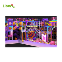 Parc d'aventure intérieur commercial sur le thème du néon avec grande piscine à balles et tour araignée