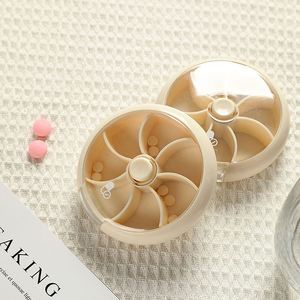 กล่องยาพลาสติกแบบหมุนได้ 7 ช่อง สำหรับพกพา จัดเก็บยาและขนมขนาดเล็ก - Product Image 2