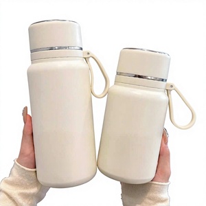 Botella de Agua de Acero Inoxidable 316 de Gran Capacidad con Aislamiento al Vacío, Tapa con Separación de Té y Agua, Taza de Regalo Unisex para Oficina y Uso en Exteriores - Product Image 1