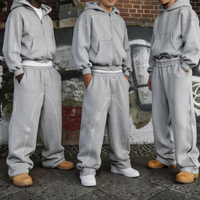 Fabricant de survêtements décontractés personnalisés : Survêtement streetwear en coton 100% épais, coupe ample, avec sweat à capuche zippé uni et pantalon de jogging à cordon de serrage