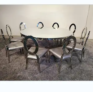 Meubles de mariage modernes, design doré, table à gâteaux ronde en acier inoxydable et chaises pour fête de mariage utilisées